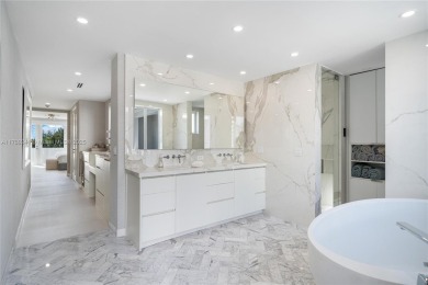 Located in the exclusive guard-gated AQUA at Allison Island on La Gorce Country Club in Florida - for sale on GolfHomes.com, golf home, golf lot