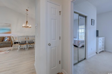 Enjoy easy coastal living in this 2-bedroom, 2-bath condo on Barefoot Resort and Golf Club  in South Carolina - for sale on GolfHomes.com, golf home, golf lot