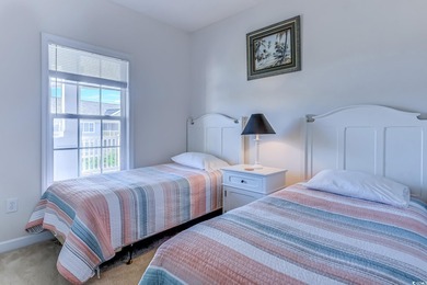 Enjoy easy coastal living in this 2-bedroom, 2-bath condo on Barefoot Resort and Golf Club  in South Carolina - for sale on GolfHomes.com, golf home, golf lot