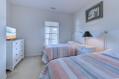 Enjoy easy coastal living in this 2-bedroom, 2-bath condo on Barefoot Resort and Golf Club  in South Carolina - for sale on GolfHomes.com, golf home, golf lot