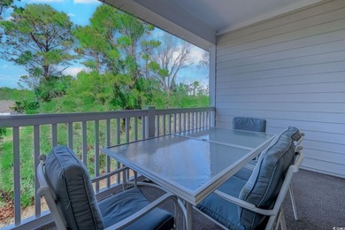 Enjoy easy coastal living in this 2-bedroom, 2-bath condo on Barefoot Resort and Golf Club  in South Carolina - for sale on GolfHomes.com, golf home, golf lot