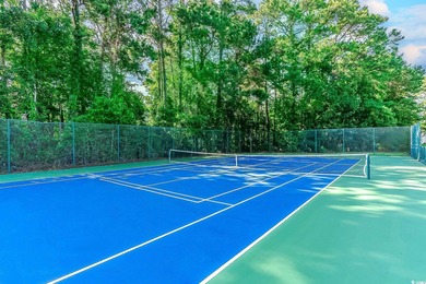 Enjoy easy coastal living in this 2-bedroom, 2-bath condo on Barefoot Resort and Golf Club  in South Carolina - for sale on GolfHomes.com, golf home, golf lot