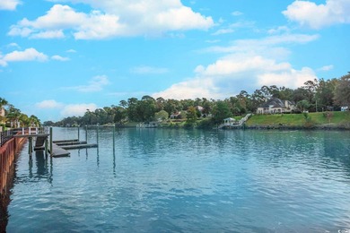 Enjoy easy coastal living in this 2-bedroom, 2-bath condo on Barefoot Resort and Golf Club  in South Carolina - for sale on GolfHomes.com, golf home, golf lot