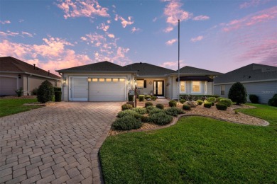 BOND PAID!! WELCOME TO THIS DESIGNER CYPRESS MODEL HOME IN THE on The Links of Spruce Creek in Florida - for sale on GolfHomes.com, golf home, golf lot