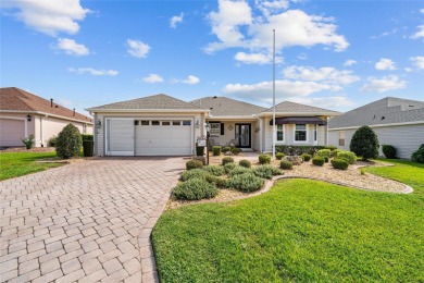BOND PAID!! WELCOME TO THIS DESIGNER CYPRESS MODEL HOME IN THE on The Links of Spruce Creek in Florida - for sale on GolfHomes.com, golf home, golf lot