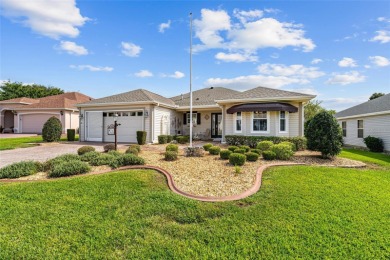 BOND PAID!! WELCOME TO THIS DESIGNER CYPRESS MODEL HOME IN THE on The Links of Spruce Creek in Florida - for sale on GolfHomes.com, golf home, golf lot