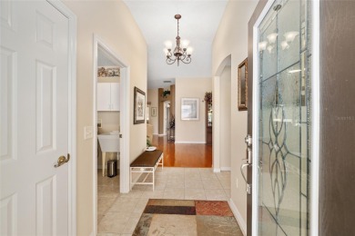 BOND PAID!! WELCOME TO THIS DESIGNER CYPRESS MODEL HOME IN THE on The Links of Spruce Creek in Florida - for sale on GolfHomes.com, golf home, golf lot