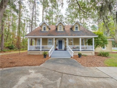 Classic Cape Cod in beautiful Oak Grove Island. This home is set on Oak Grove Island Golf and Country Club in Georgia - for sale on GolfHomes.com, golf home, golf lot