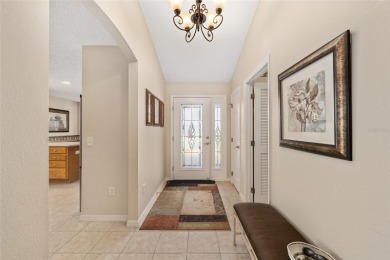 BOND PAID!! WELCOME TO THIS DESIGNER CYPRESS MODEL HOME IN THE on The Links of Spruce Creek in Florida - for sale on GolfHomes.com, golf home, golf lot