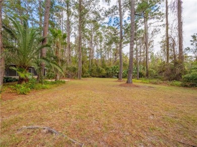 Classic Cape Cod in beautiful Oak Grove Island. This home is set on Oak Grove Island Golf and Country Club in Georgia - for sale on GolfHomes.com, golf home, golf lot