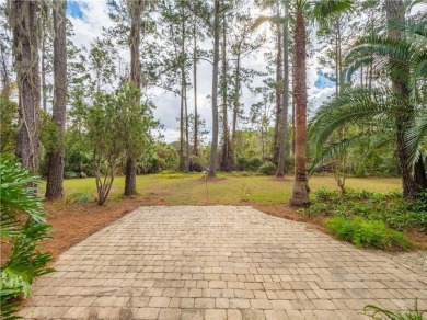 Classic Cape Cod in beautiful Oak Grove Island. This home is set on Oak Grove Island Golf and Country Club in Georgia - for sale on GolfHomes.com, golf home, golf lot