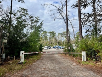 Classic Cape Cod in beautiful Oak Grove Island. This home is set on Oak Grove Island Golf and Country Club in Georgia - for sale on GolfHomes.com, golf home, golf lot