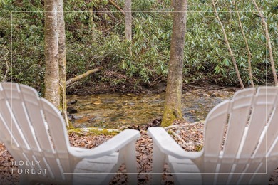 Enjoy a private 0.75-acre setting with the year-round sounds of on Sapphire National Golf Club in North Carolina - for sale on GolfHomes.com, golf home, golf lot