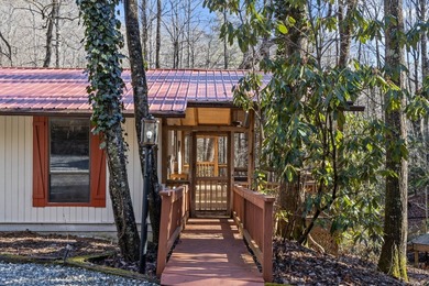 Enjoy a private 0.75-acre setting with the year-round sounds of on Sapphire National Golf Club in North Carolina - for sale on GolfHomes.com, golf home, golf lot