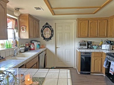 Perfect family home! This 3 bedroom, 2 bath, singles story home on Lake Elizabeth Golf and Ranch Club in California - for sale on GolfHomes.com, golf home, golf lot