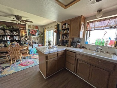 Perfect family home! This 3 bedroom, 2 bath, singles story home on Lake Elizabeth Golf and Ranch Club in California - for sale on GolfHomes.com, golf home, golf lot