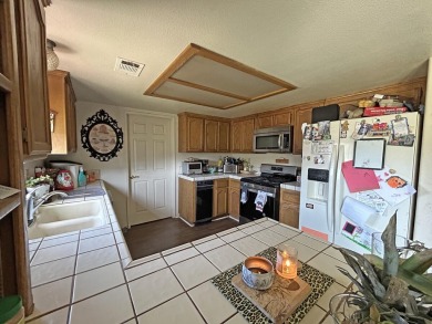 Perfect family home! This 3 bedroom, 2 bath, singles story home on Lake Elizabeth Golf and Ranch Club in California - for sale on GolfHomes.com, golf home, golf lot