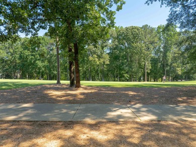 Views along the tranquil 12th green of the prestigious Jack on Great Waters Course At Reynolds Plantation in Georgia - for sale on GolfHomes.com, golf home, golf lot