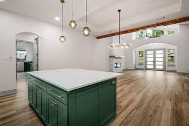 Modern design and timeless craftsmanship combine in this 2,344 on Pecan Plantation Country Club in Texas - for sale on GolfHomes.com, golf home, golf lot
