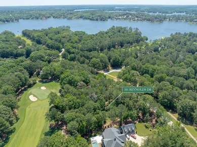 Views along the tranquil 12th green of the prestigious Jack on Great Waters Course At Reynolds Plantation in Georgia - for sale on GolfHomes.com, golf home, golf lot