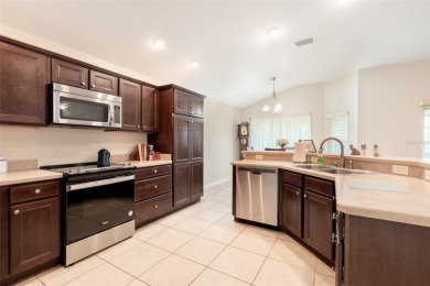WELCOME TO THIS BEAUTIFUL CEDAR DESIGNER SERIES BLOCK HOME in on Bella Glade Country Club in Florida - for sale on GolfHomes.com, golf home, golf lot
