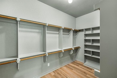 Modern design and timeless craftsmanship combine in this 2,344 on Pecan Plantation Country Club in Texas - for sale on GolfHomes.com, golf home, golf lot