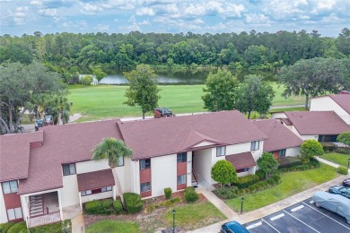 Wake up to stunning views of Jade Lake, the 11th Green of the on Country Club At Silver Springs Shores in Florida - for sale on GolfHomes.com, golf home, golf lot