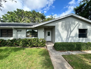 Discover this charming one-story villa in the all-ages on Delray Beach Golf Club in Florida - for sale on GolfHomes.com, golf home, golf lot