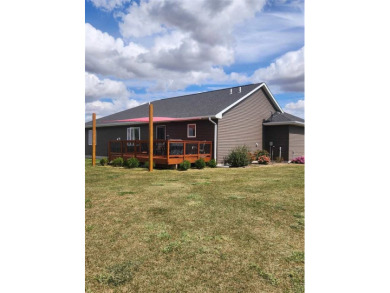 Welcome to your dream home! This stunning 4-bedroom, 3-bathroom on West Liberty Golf and Country Club in Iowa - for sale on GolfHomes.com, golf home, golf lot