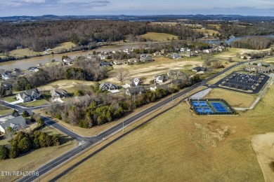 Stunning All-Brick Home with 3 car garage in Kahite subdivision on Tellico Village -The Links At Kahite Golf Course in Tennessee - for sale on GolfHomes.com, golf home, golf lot