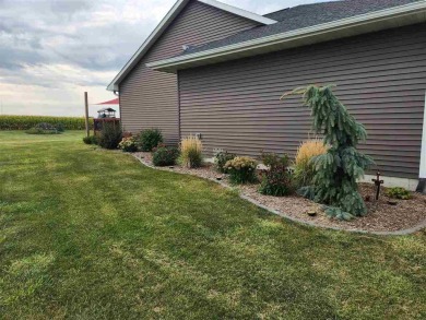 Welcome to your dream home! This stunning 4-bedroom, 3-bathroom on West Liberty Golf and Country Club in Iowa - for sale on GolfHomes.com, golf home, golf lot