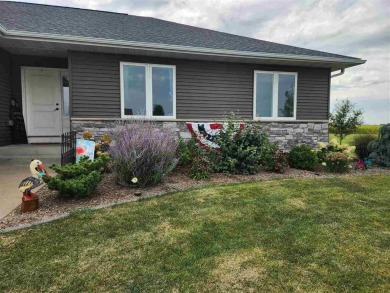 Welcome to your dream home! This stunning 4-bedroom, 3-bathroom on West Liberty Golf and Country Club in Iowa - for sale on GolfHomes.com, golf home, golf lot