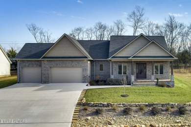 Stunning All-Brick Home with 3 car garage in Kahite subdivision on Tellico Village -The Links At Kahite Golf Course in Tennessee - for sale on GolfHomes.com, golf home, golf lot