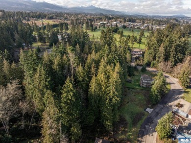 Approximately 1 acre in a neighborhood of upscale homes with on Peninsula Golf Club Inc. in Washington - for sale on GolfHomes.com, golf home, golf lot