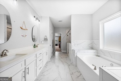 Welcome to 2046 Mill Pond Court in Jefferson, where luxury on Traditions of Braselton Golf Club in Georgia - for sale on GolfHomes.com, golf home, golf lot