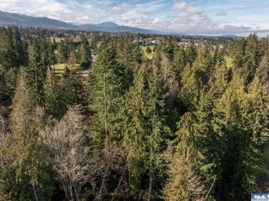 Approximately 1 acre in a neighborhood of upscale homes with on Peninsula Golf Club Inc. in Washington - for sale on GolfHomes.com, golf home, golf lot