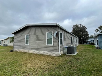 355 Putter Circle 2 bedroom 2 bath, 1344 SQ FT listed for $139 on Lake Henry Golf Club in Florida - for sale on GolfHomes.com, golf home, golf lot