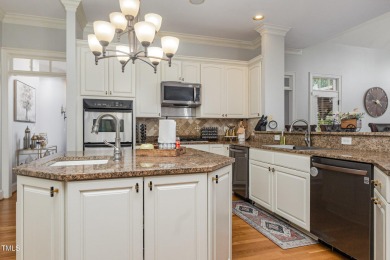 Experience unparalleled luxury and breathtaking views in this on TPC at Wakefield Plantation in North Carolina - for sale on GolfHomes.com, golf home, golf lot