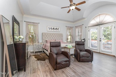 Experience unparalleled luxury and breathtaking views in this on TPC at Wakefield Plantation in North Carolina - for sale on GolfHomes.com, golf home, golf lot