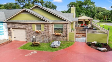 Discover this charming well maintained turnkey 3-bedroom, 2-bath on Arcadian Shores Golf Club in South Carolina - for sale on GolfHomes.com, golf home, golf lot