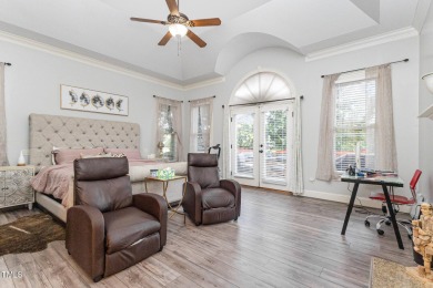 Experience unparalleled luxury and breathtaking views in this on TPC at Wakefield Plantation in North Carolina - for sale on GolfHomes.com, golf home, golf lot