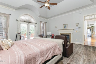 Experience unparalleled luxury and breathtaking views in this on TPC at Wakefield Plantation in North Carolina - for sale on GolfHomes.com, golf home, golf lot