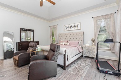 Experience unparalleled luxury and breathtaking views in this on TPC at Wakefield Plantation in North Carolina - for sale on GolfHomes.com, golf home, golf lot