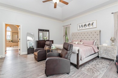 Experience unparalleled luxury and breathtaking views in this on TPC at Wakefield Plantation in North Carolina - for sale on GolfHomes.com, golf home, golf lot
