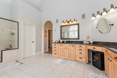 Experience unparalleled luxury and breathtaking views in this on TPC at Wakefield Plantation in North Carolina - for sale on GolfHomes.com, golf home, golf lot