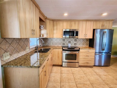 Minutes to the public beach this Beautifully Updated  Fully on Boca Royale Golf and Country Club in Florida - for sale on GolfHomes.com, golf home, golf lot