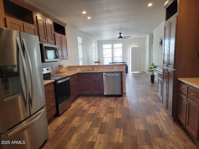 This is a beautiful new build 3 bedroom 2 bath home. Laminate on 3 Parks Fairways in Arizona - for sale on GolfHomes.com, golf home, golf lot