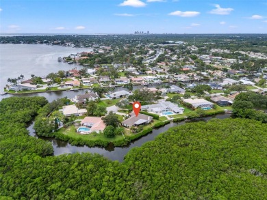 Under contract-accepting backup offers. NO HURRICANE DAMAGE OR on Mangrove Bay Golf Course in Florida - for sale on GolfHomes.com, golf home, golf lot