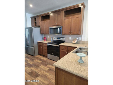 This is a beautiful new build 3 bedroom 2 bath home. Laminate on 3 Parks Fairways in Arizona - for sale on GolfHomes.com, golf home, golf lot