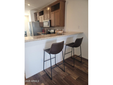 This is a beautiful new build 3 bedroom 2 bath home. Laminate on 3 Parks Fairways in Arizona - for sale on GolfHomes.com, golf home, golf lot